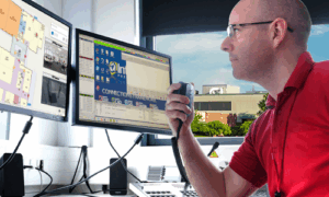 911 telecommunicator using INSIDE in a dispatch center. See what's INSIDE, indoor mapping for public safety