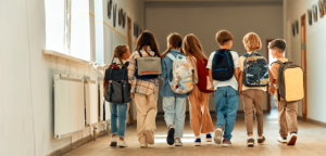 Students walking the hallway of an elementary school